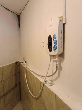 Imagen general del Hotel OYO Home 90723 Green Leaf Guest Lodge Kk. Foto 6