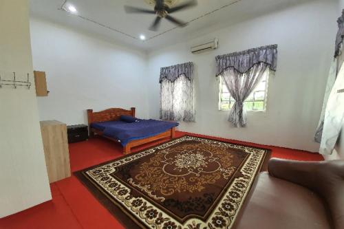 Imagen de la habitación del Hotel OYO Home 90723 Green Leaf Guest Lodge Kk. Foto 14