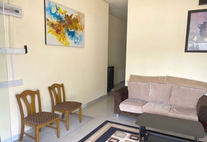 Imagen de los interiores del Hotel OYO Home 90904 Ray Yan Guesthouse. Foto 16