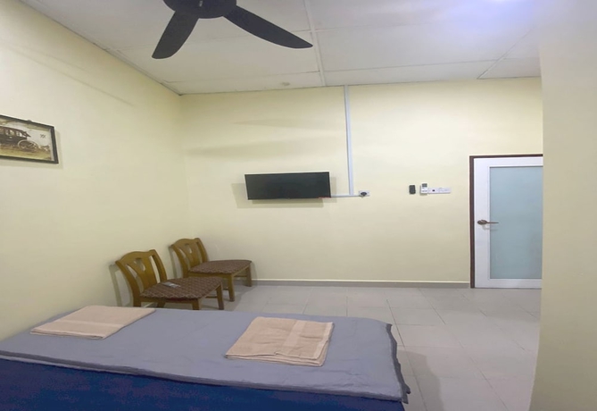 Imagen de la habitación del Hotel OYO Home 90904 Ray Yan Guesthouse. Foto 9