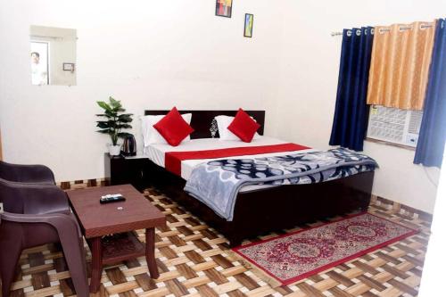 Imagen de la habitación del Hotel OYO Home Mahadev Sadan Guest House. Foto 20