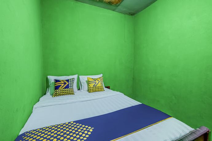 Imagen de la habitación del Hotel OYO Homes 90996 Desa Wisata Pulesari Syariah. Foto 3