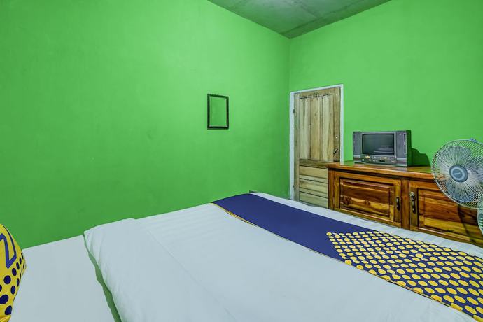 Imagen de la habitación del Hotel OYO Homes 90996 Desa Wisata Pulesari Syariah. Foto 4