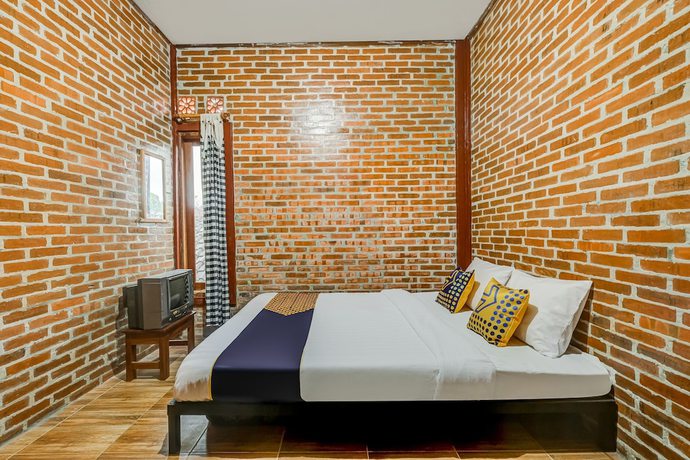Imagen de la habitación del Hotel OYO Homes 90996 Desa Wisata Pulesari Syariah. Foto 8