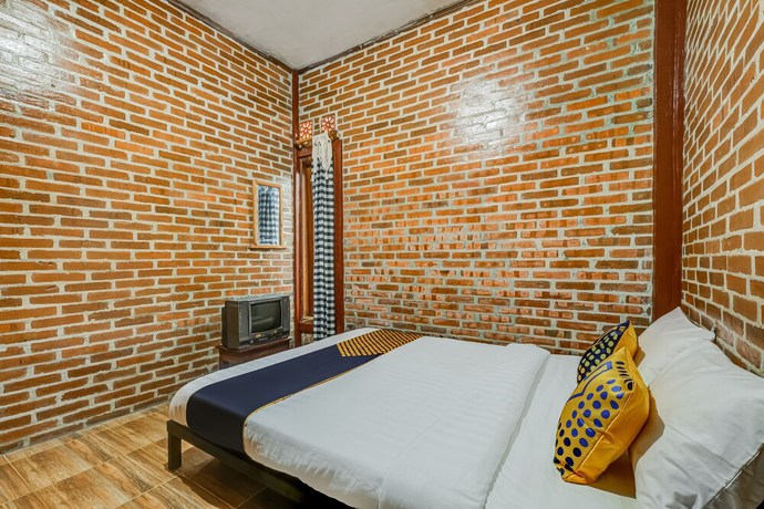 Imagen de la habitación del Hotel OYO Homes 90996 Desa Wisata Pulesari Syariah. Foto 10