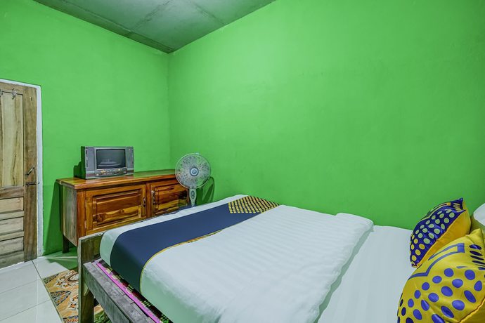 Imagen de la habitación del Hotel OYO Homes 90996 Desa Wisata Pulesari Syariah. Foto 12