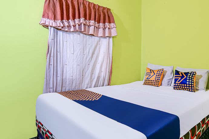 Imagen de la habitación del Hotel OYO Homes 90997 Eco Tourism Desa Cibodas Babakan Gentong 2 Syariah. Foto 5