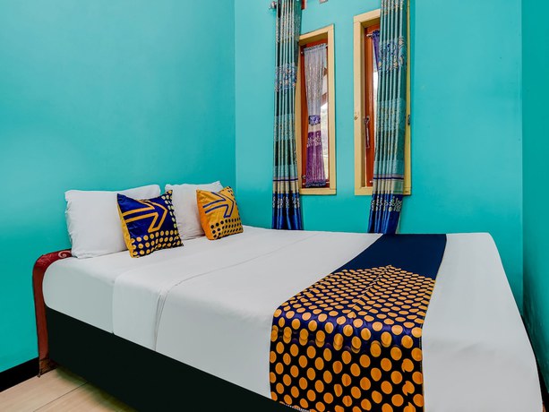 Imagen de la habitación del Hotel OYO Homes 90997 Eco Tourism Desa Cibodas Babakan Gentong 2 Syariah. Foto 6