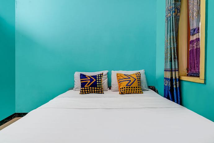 Imagen de la habitación del Hotel OYO Homes 90997 Eco Tourism Desa Cibodas Babakan Gentong 2 Syariah. Foto 9