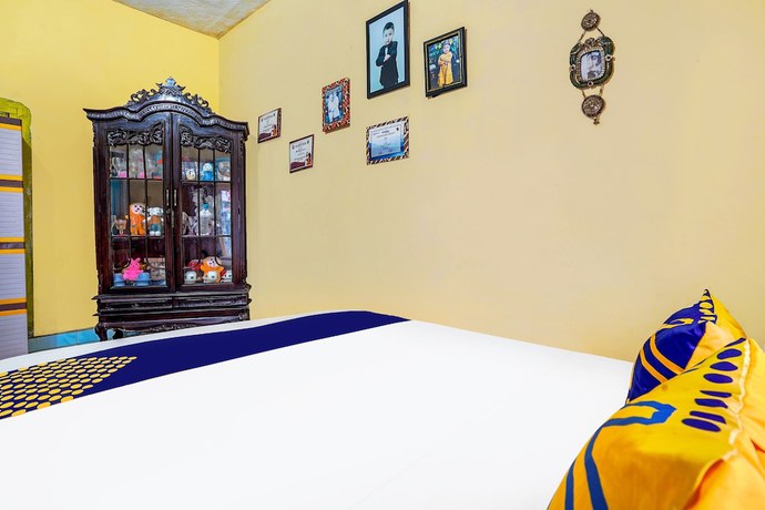 Imagen de la habitación del Hotel OYO Homes 91002 Eco Tourism Desa Cibodas Areng 3 Syariah. Foto 5