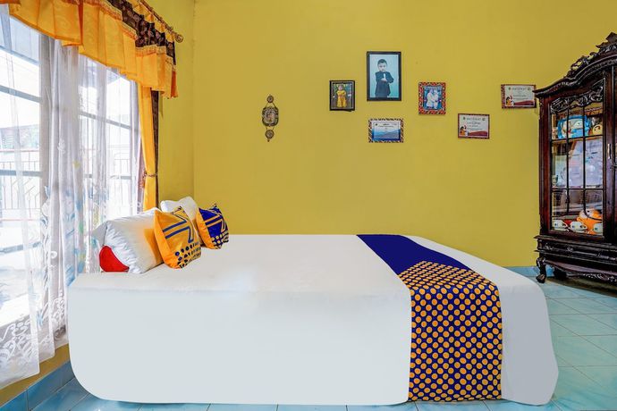 Imagen de la habitación del Hotel OYO Homes 91002 Eco Tourism Desa Cibodas Areng 3 Syariah. Foto 7