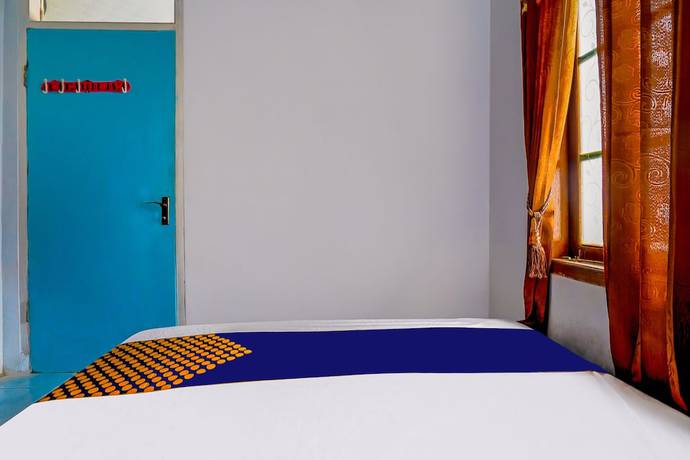 Imagen de la habitación del Hotel OYO Homes 91002 Eco Tourism Desa Cibodas Areng 3 Syariah. Foto 9