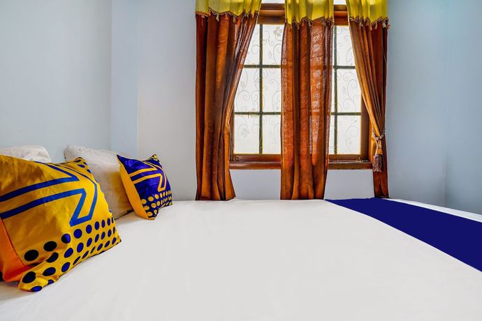 Imagen de la habitación del Hotel OYO Homes 91002 Eco Tourism Desa Cibodas Areng 3 Syariah. Foto 11