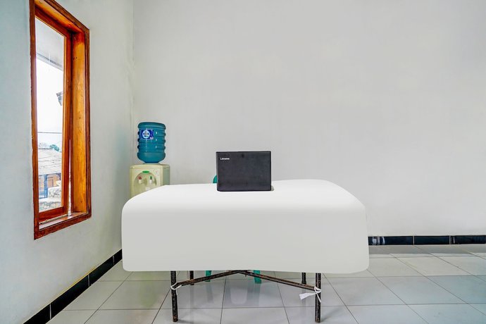 Imagen de los interiores del Hotel OYO Homes 91002 Eco Tourism Desa Cibodas Areng 3 Syariah. Foto 20