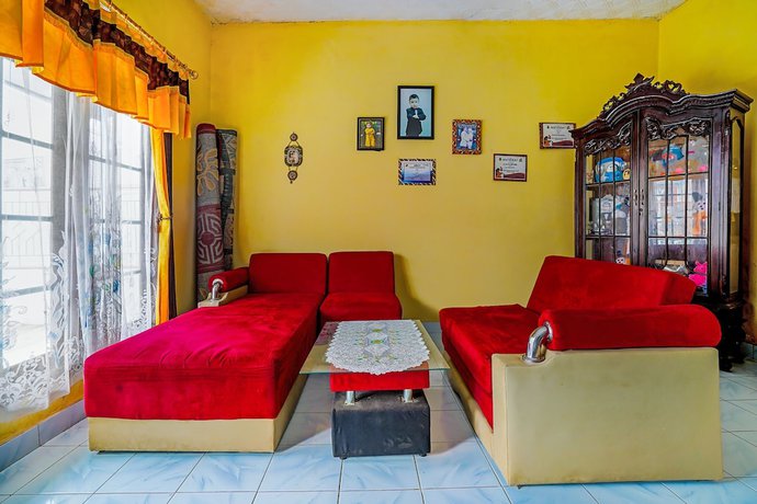 Imagen de la habitación del Hotel OYO Homes 91002 Eco Tourism Desa Cibodas Areng 3 Syariah. Foto 14