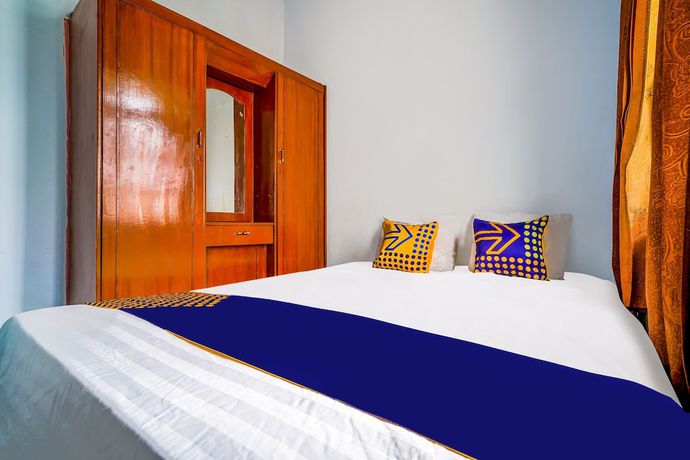 Imagen de la habitación del Hotel OYO Homes 91002 Eco Tourism Desa Cibodas Areng 3 Syariah. Foto 15