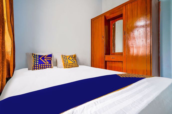 Imagen de la habitación del Hotel OYO Homes 91002 Eco Tourism Desa Cibodas Areng 3 Syariah. Foto 16