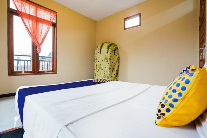 Imagen de la habitación del Hotel OYO Homes 91008 Eco Tourism Desa Cibodas Babakan Gentong 1 Syariah. Foto 5