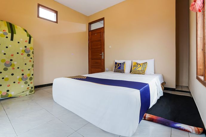 Imagen de la habitación del Hotel OYO Homes 91008 Eco Tourism Desa Cibodas Babakan Gentong 1 Syariah. Foto 6