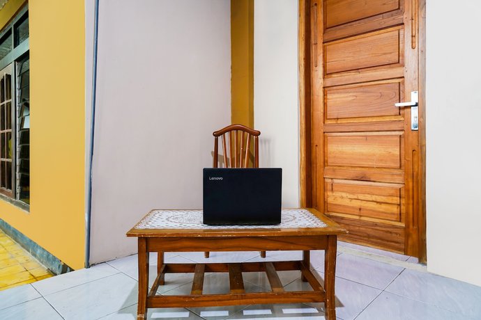 Imagen de los interiores del Hotel OYO Homes 91008 Eco Tourism Desa Cibodas Babakan Gentong 1 Syariah. Foto 20