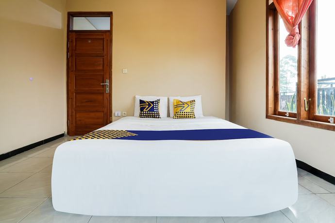 Imagen de la habitación del Hotel OYO Homes 91008 Eco Tourism Desa Cibodas Babakan Gentong 1 Syariah. Foto 10