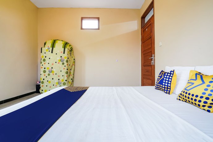 Imagen de la habitación del Hotel OYO Homes 91008 Eco Tourism Desa Cibodas Babakan Gentong 1 Syariah. Foto 15