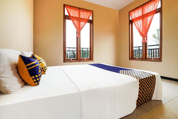 Imagen de la habitación del Hotel OYO Homes 91008 Eco Tourism Desa Cibodas Babakan Gentong 1 Syariah. Foto 16