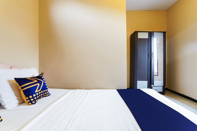 Imagen de la habitación del Hotel OYO Homes 91008 Eco Tourism Desa Cibodas Babakan Gentong 1 Syariah. Foto 17