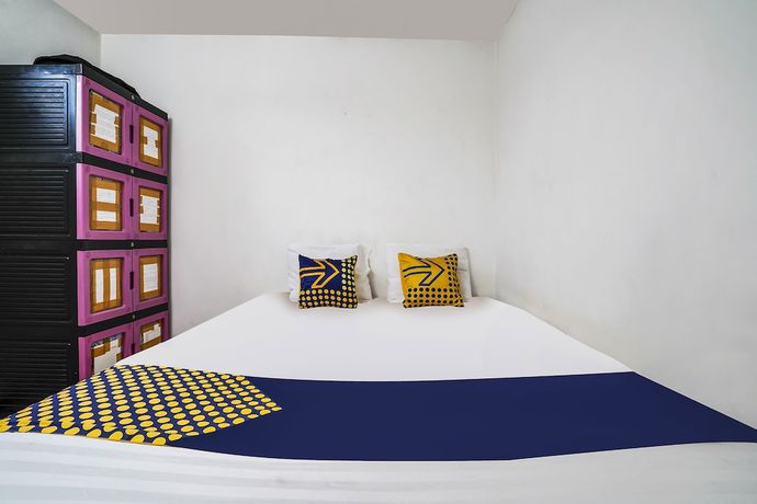 Imagen de la habitación del Hotel OYO Homes 91009 Eco Tourism Desa Cibodas Areng 4 Syariah. Foto 3