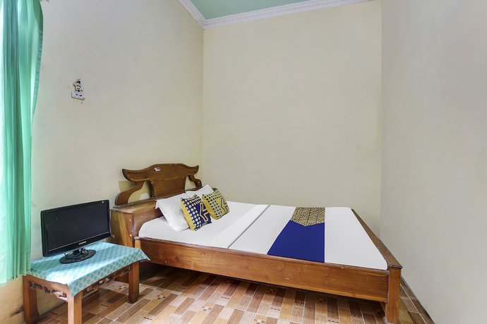 Imagen de la habitación del Hotel OYO Homes 91151 Desa Wisata Kreatif Perdamaian Srumbung Gunung. Foto 2