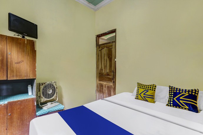 Imagen de la habitación del Hotel OYO Homes 91151 Desa Wisata Kreatif Perdamaian Srumbung Gunung. Foto 3