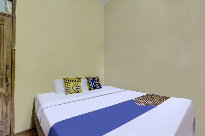 Imagen de la habitación del Hotel OYO Homes 91151 Desa Wisata Kreatif Perdamaian Srumbung Gunung. Foto 5
