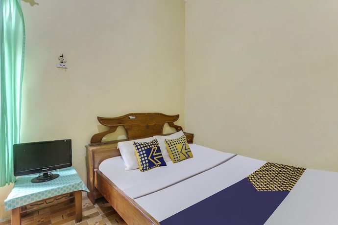 Imagen de la habitación del Hotel OYO Homes 91151 Desa Wisata Kreatif Perdamaian Srumbung Gunung. Foto 6