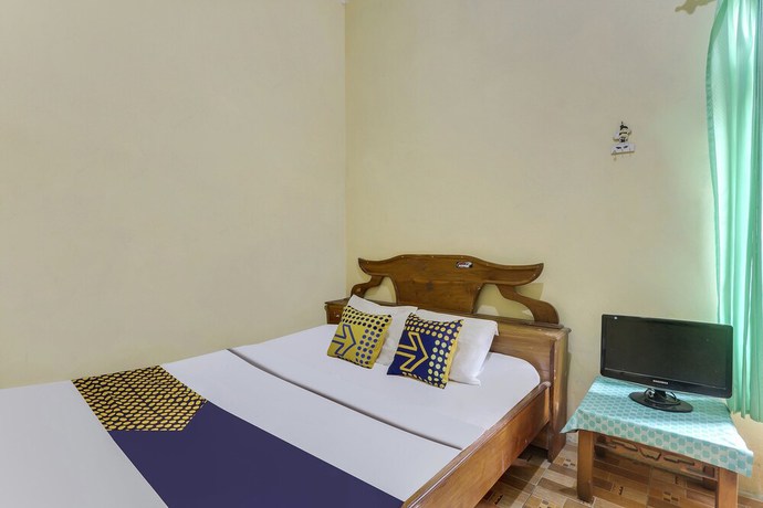 Imagen de la habitación del Hotel OYO Homes 91151 Desa Wisata Kreatif Perdamaian Srumbung Gunung. Foto 7