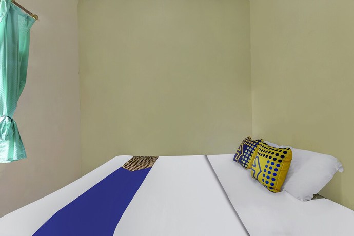 Imagen de la habitación del Hotel OYO Homes 91151 Desa Wisata Kreatif Perdamaian Srumbung Gunung. Foto 8