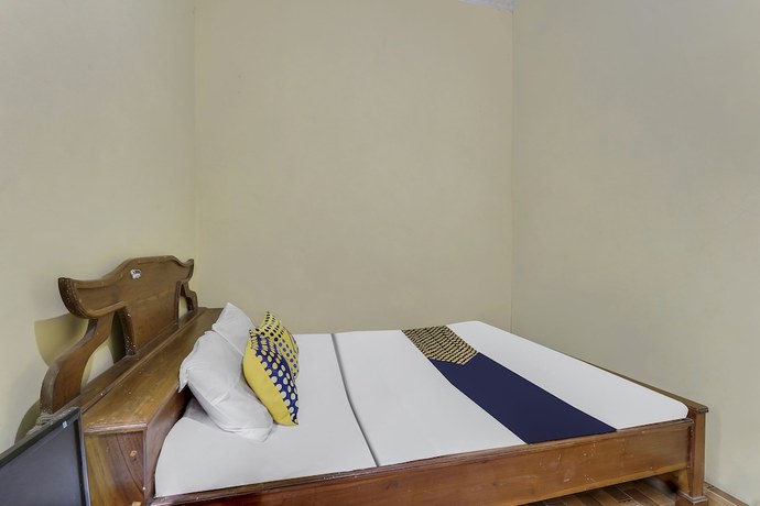 Imagen de la habitación del Hotel OYO Homes 91151 Desa Wisata Kreatif Perdamaian Srumbung Gunung. Foto 9