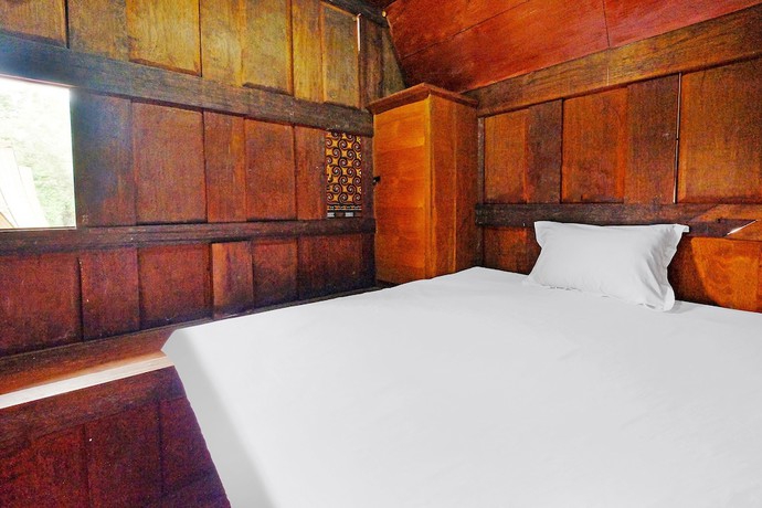 Imagen de la habitación del Hotel OYO Homes 91167 Tatto Bara Homestay. Foto 2