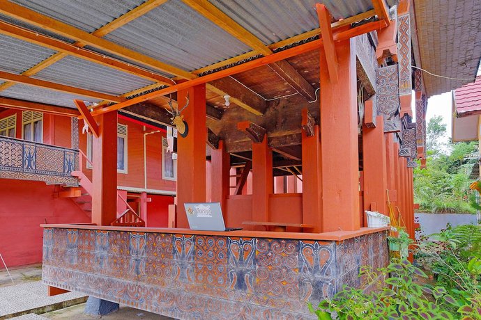 Imagen de los interiores del Hotel OYO Homes 91167 Tatto Bara Homestay. Foto 13
