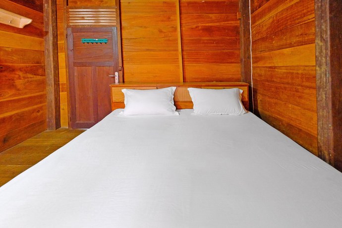 Imagen de la habitación del Hotel OYO Homes 91167 Tatto Bara Homestay. Foto 3