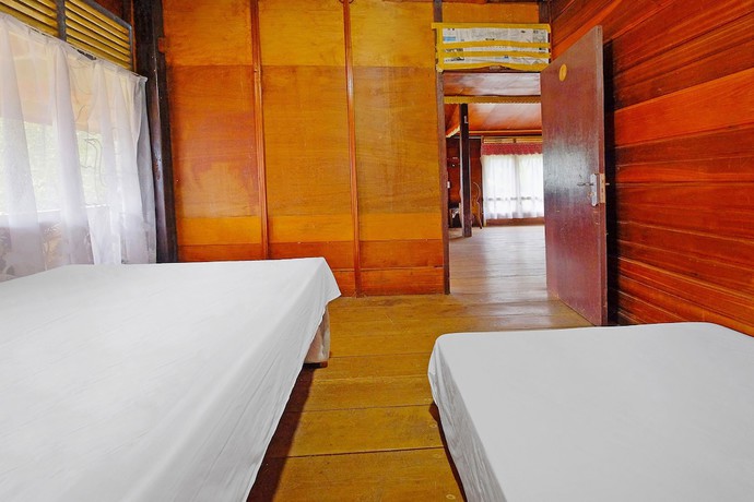 Imagen de la habitación del Hotel OYO Homes 91167 Tatto Bara Homestay. Foto 4