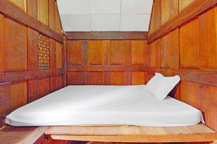 Imagen de la habitación del Hotel OYO Homes 91167 Tatto Bara Homestay. Foto 5