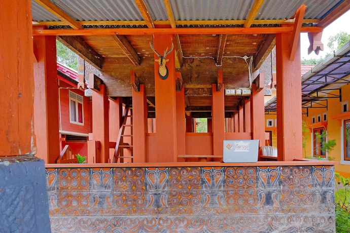 Imagen de los interiores del Hotel OYO Homes 91167 Tatto Bara Homestay. Foto 15