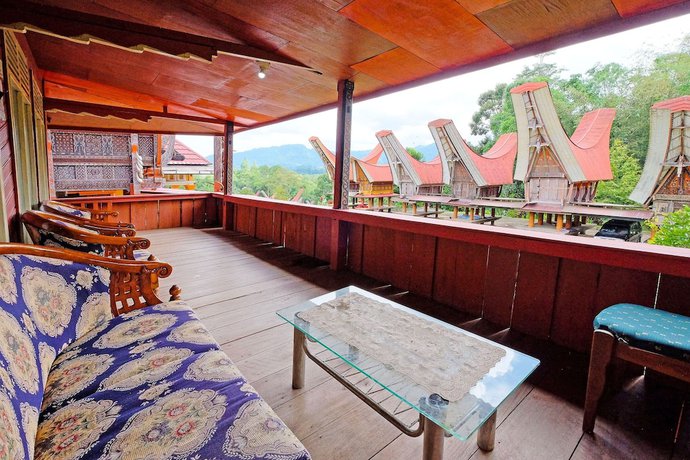 Imagen de los interiores del Hotel OYO Homes 91167 Tatto Bara Homestay. Foto 16