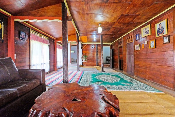 Imagen de los interiores del Hotel OYO Homes 91167 Tatto Bara Homestay. Foto 17