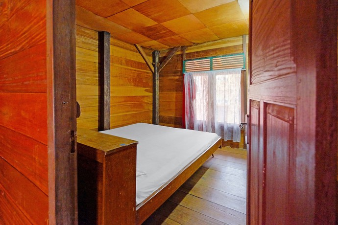 Imagen de la habitación del Hotel OYO Homes 91167 Tatto Bara Homestay. Foto 8