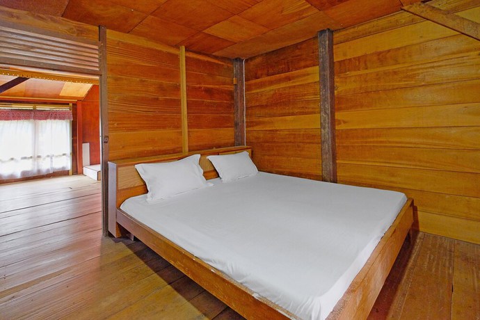 Imagen de la habitación del Hotel OYO Homes 91167 Tatto Bara Homestay. Foto 9