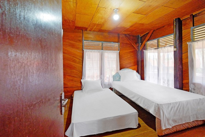Imagen de la habitación del Hotel OYO Homes 91167 Tatto Bara Homestay. Foto 10