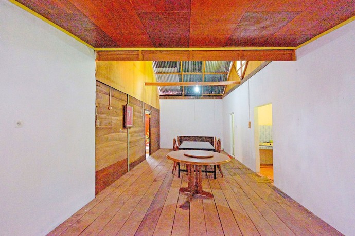 Imagen de los interiores del Hotel OYO Homes 91167 Tatto Bara Homestay. Foto 18