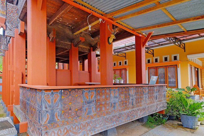 Imagen de los interiores del Hotel OYO Homes 91167 Tatto Bara Homestay. Foto 19