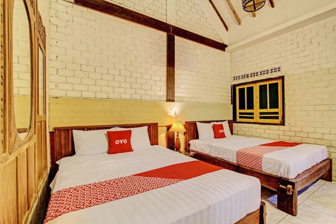 Imagen de la habitación del Hotel OYO Homes 93598 Omah Baturan Syariah. Foto 6
